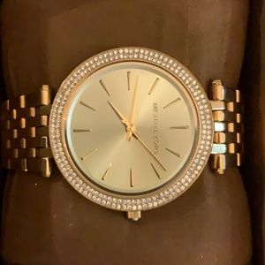 Michael Kors women’s gold round watch